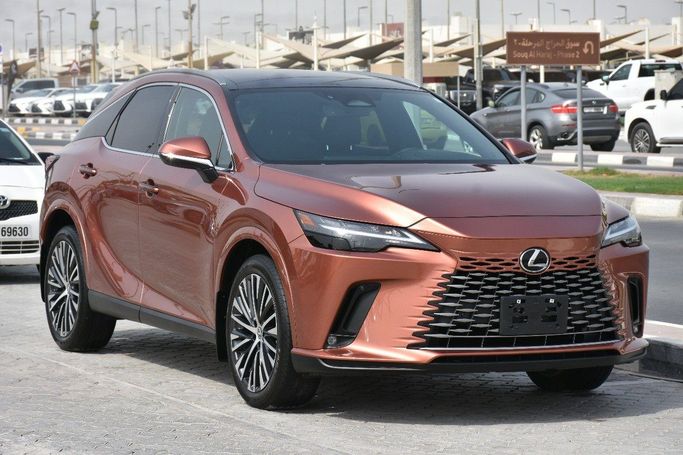 Подержанный Lexus RX 350 V, 2.4 л, 2023 в Шардже от Alfaris Used Cars Коричневый цвет.  | AUTO.AE