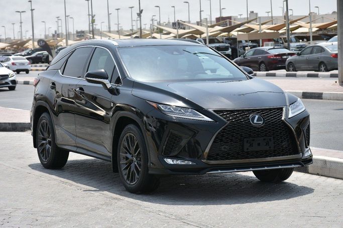 Подержанный Lexus RX 350L IV Рестайлинг, 3.5 л, 2021 в Шардже от Alfaris Used Cars Черный цвет.  | AUTO.AE