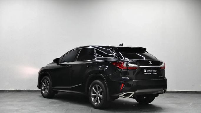 Подержанный Lexus RX 350 IV, 3.5 л, 2019 в Шардже от Al Qassem Cars Trading Черный цвет. Канадская | AUTO.AE
