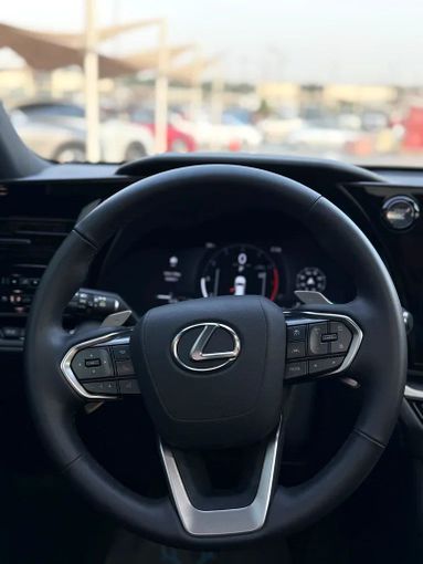 Подержанный Lexus TX 350, 2.4 л, 2024 в Шардже от Istanbul Elite Used Cars Белый цвет. Канадская | AUTO.AE