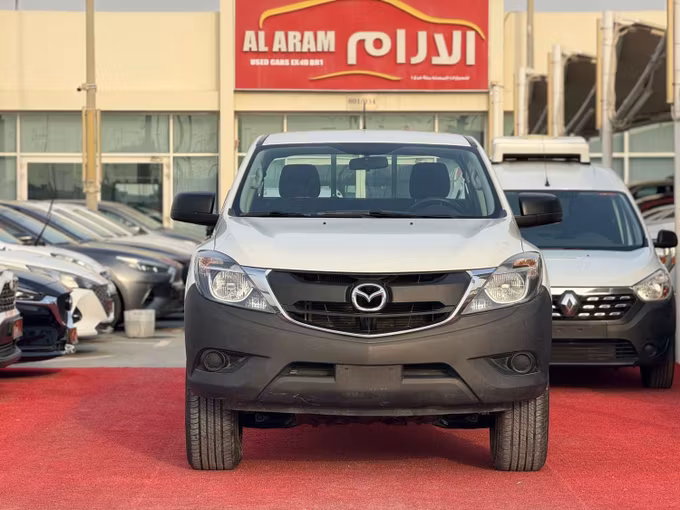 Used Mazda BT-50 II Facelift, 2.5 l, 2020 in Sharjah by Al Aram Cars, White color. GCC Specs | AUTO.AE
