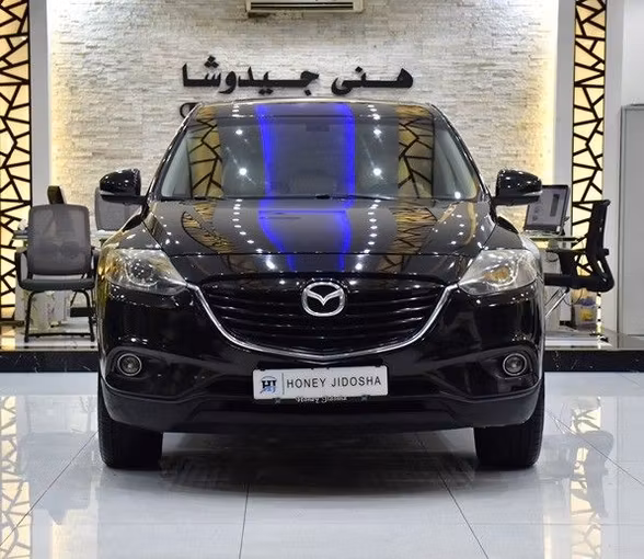 Подержанный Mazda CX-9 I Рестайлинг, 3.7 л, 2014 в Шардже от Honey Gidosha Used Cars Tr. Черный цвет.  | AUTO.AE
