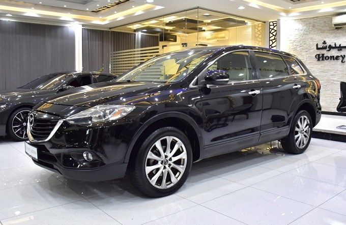 Подержанный Mazda CX-9 I Рестайлинг, 3.7 л, 2014 в Шардже от Honey Gidosha Used Cars Tr. Черный цвет.  | AUTO.AE