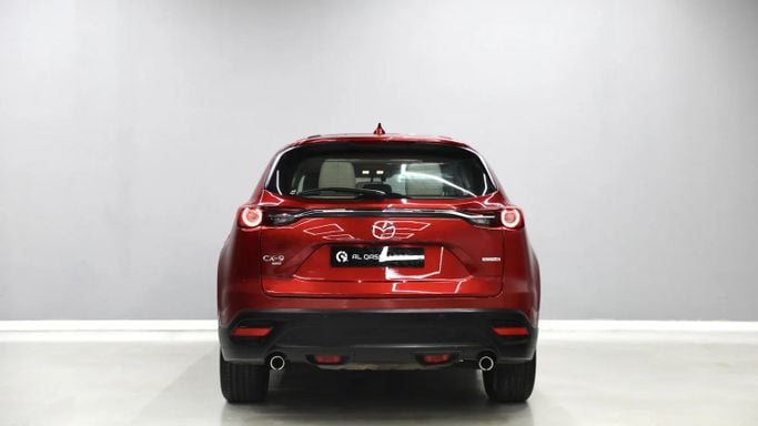 Used Mazda CX-9 II Facelift, 2.5 l, 2021 in Sharjah by Al Qassem Cars Trading, Red color. GCC Specs | AUTO.AE