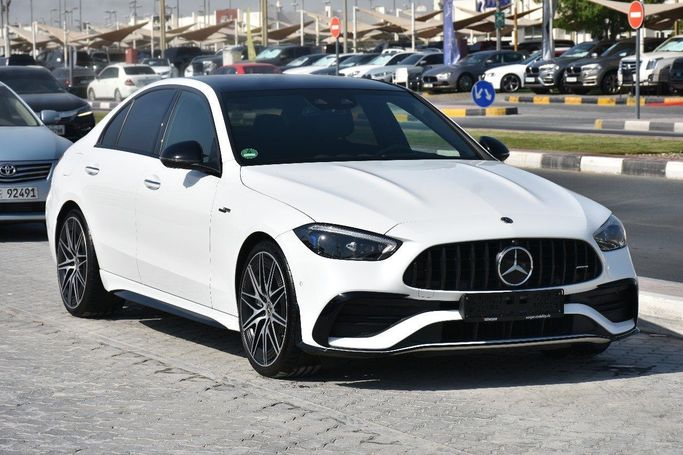 Подержанный Mercedes-Benz C-Class AMG 43 AMG V (W206), 2.0 л, 2023 в Шардже от Alfaris Used Cars Белый цвет.  | AUTO.AE
