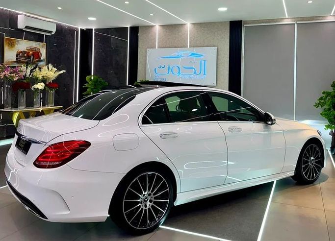 Used Mercedes-Benz C-Class 200 IV (W205) Facelift, 2.0 l, 2019 in Sharjah by Ayoon Alhoot Motors, White color. GCC Specs | AUTO.AE