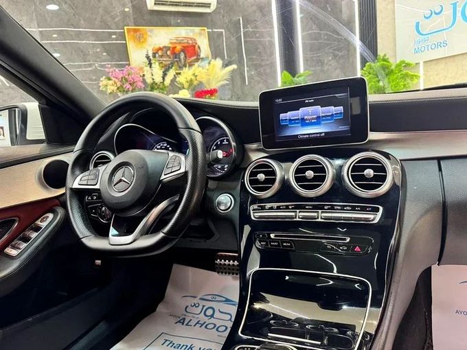 Подержанный Mercedes-Benz C-Class 200 III (W204) Рестайлинг, 1.8 л, 2015 в Шардже от Ayoon Alhoot Motors Белый цвет. GCC | AUTO.AE