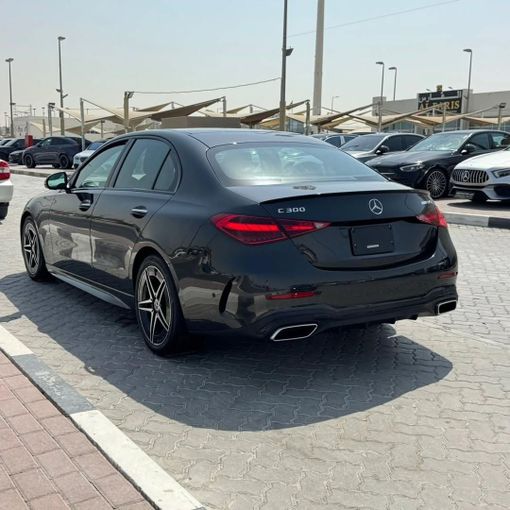 Used Mercedes-Benz C-Class 300 V (W206), 2.0 l, 2023 in Sharjah by Alfaris Used Cars, Black color.  | AUTO.AE