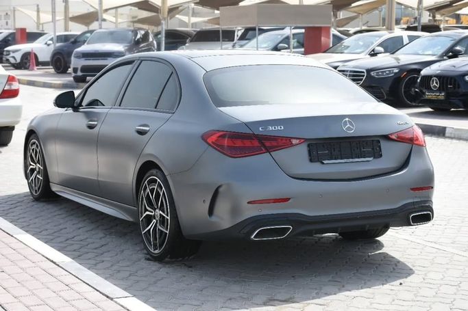 Used Mercedes-Benz C-Class 300 V (W206), 2.0 l, 2023 in Sharjah by Alfaris Used Cars, Grey color.  | AUTO.AE