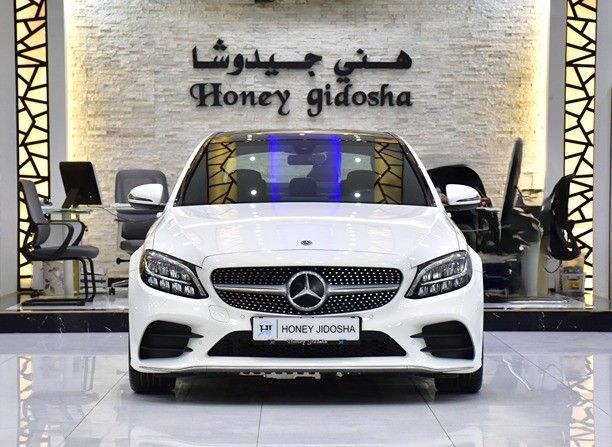 Подержанный Mercedes-Benz C-Class 200 IV (W205) Рестайлинг, 2.0 л, 2020 в Шардже от Honey Gidosha Used Cars Tr. Белый цвет.  | AUTO.AE