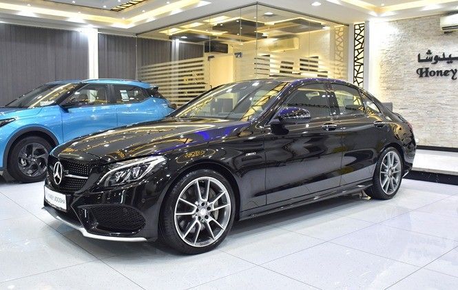 Подержанный Mercedes-Benz C-Class 400 IV (W205), 3.0 л, 2016 в Шардже от Honey Gidosha Used Cars Tr. Черный цвет. GCC | AUTO.AE