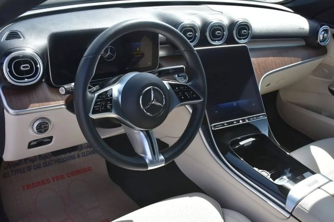 Used Mercedes-Benz C-Class 300 V (W206), 2.0 l, 2022 in Sharjah by Alfaris Used Cars, White color.  | AUTO.AE