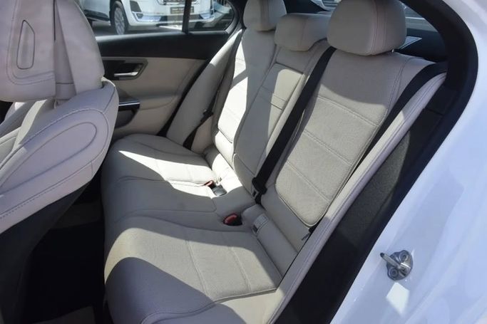 Used Mercedes-Benz C-Class 300 V (W206), 2.0 l, 2022 in Sharjah by Alfaris Used Cars, White color.  | AUTO.AE