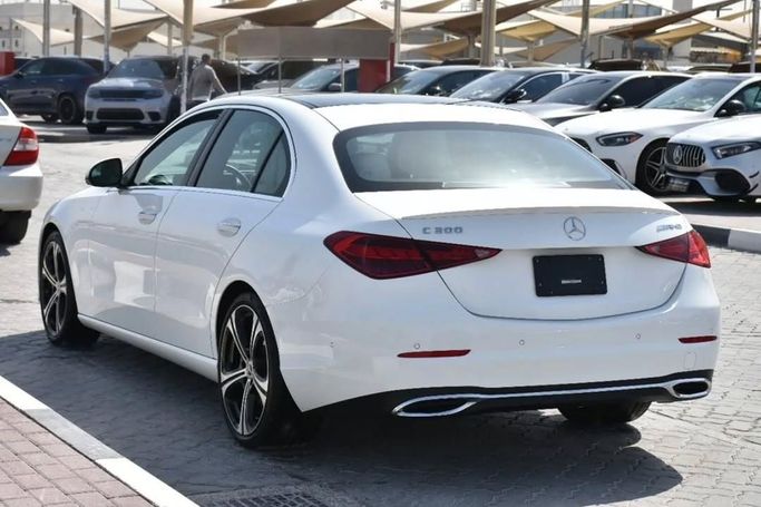 Used Mercedes-Benz C-Class 300 V (W206), 2.0 l, 2022 in Sharjah by Alfaris Used Cars, White color.  | AUTO.AE