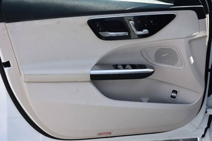 Used Mercedes-Benz C-Class 300 V (W206), 2.0 l, 2022 in Sharjah by Alfaris Used Cars, White color.  | AUTO.AE
