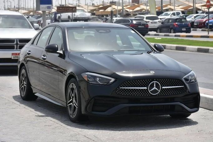 Used Mercedes-Benz C-Class 300 V (W206), 2.0 l, 2023 in Sharjah by Alfaris Used Cars, Black color.  | AUTO.AE