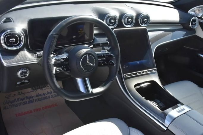 Used Mercedes-Benz C-Class 300 V (W206), 2.0 l, 2022 in Sharjah by Alfaris Used Cars, White color.  | AUTO.AE