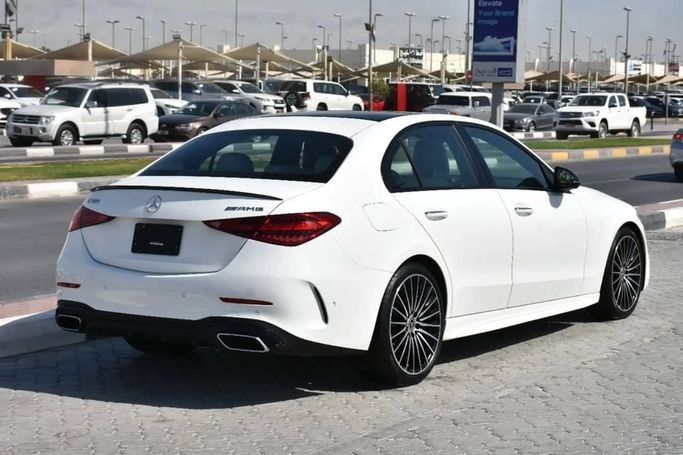 Used Mercedes-Benz C-Class 300 V (W206), 2.0 l, 2022 in Sharjah by Alfaris Used Cars, White color.  | AUTO.AE