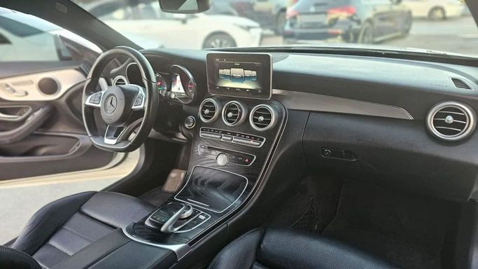 Used Mercedes-Benz C-Class 200 IV (W205) Facelift, 2.0 l, 2018 in Sharjah by Nour Alnukhba Motors, White color. Korean Specs | AUTO.AE