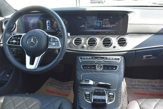 Подержанный Mercedes-Benz E-Class 450 V (W213, S213, C238), 3.0 л, 2019 в Шардже от Alfaris Used Cars Серый цвет.  | AUTO.AE
