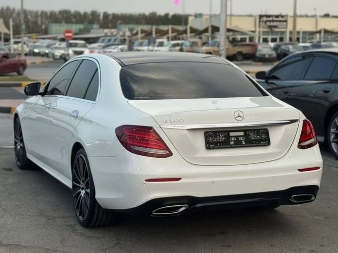 Used Mercedes-Benz E-Class 300 V (W213, S213, C238), 2.0 l, 2018 in Sharjah by Nour Alnukhba Motors, White color. GCC Specs | AUTO.AE