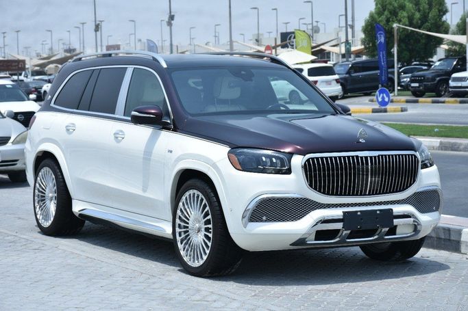 Подержанный Mercedes-Benz GLS 580 II (X167), 4.0 л, 2020 в Шардже от Alfaris Used Cars Белый цвет.  | AUTO.AE