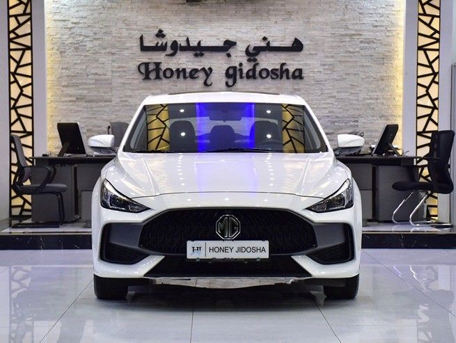 Used MG 5 II, 1.5 l, 2024 in Sharjah by Honey Gidosha Used Cars Tr., White color.  | AUTO.AE
