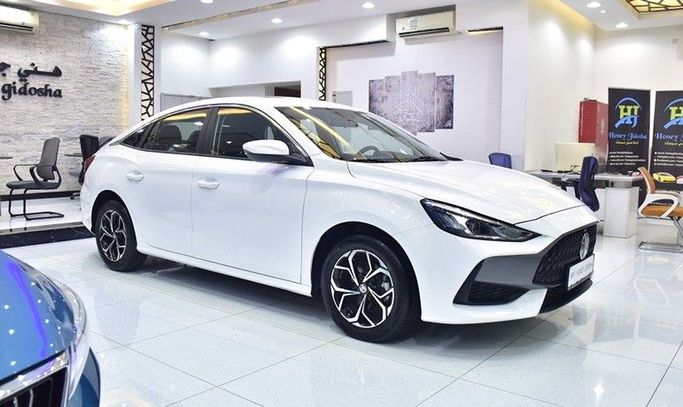 Used MG 5 II, 1.5 l, 2024 in Sharjah by Honey Gidosha Used Cars Tr., White color.  | AUTO.AE