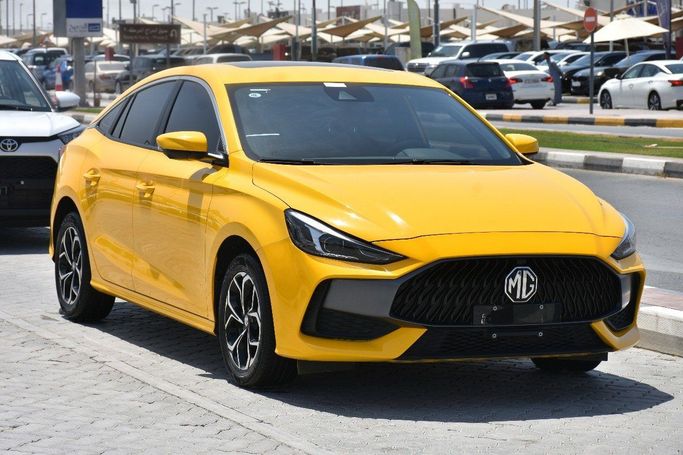 Подержанный MG 5 Scorpio, 1.5 л, 2022 в Шардже от Alfaris Used Cars Желтый цвет.  | AUTO.AE