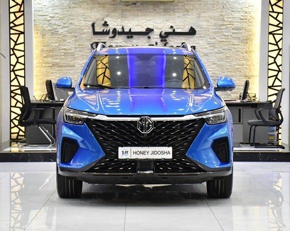 Подержанный MG RX5 II, 1.5 л, 2024 в Шардже от Honey Gidosha Used Cars Tr. Синий цвет.  | AUTO.AE