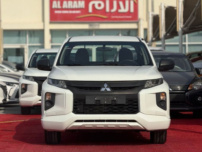 New Mitsubishi L200 V Facelift, 2.5 l, 2022 in Sharjah by Al Aram Cars, White color. GCC Specs | AUTO.AE