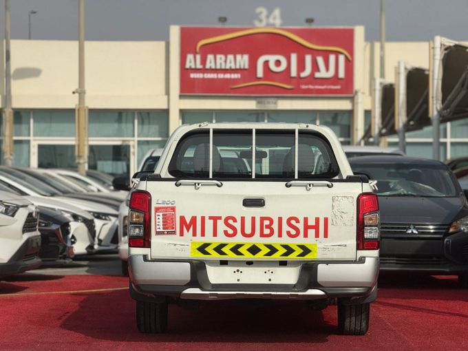 New Mitsubishi L200 V Facelift, 2.5 l, 2022 in Sharjah by Al Aram Cars, White color. GCC Specs | AUTO.AE
