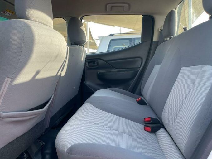 New Mitsubishi L200 V Facelift, 2.4 l, 2021 in Sharjah by Al Aram Cars, White color. GCC Specs | AUTO.AE