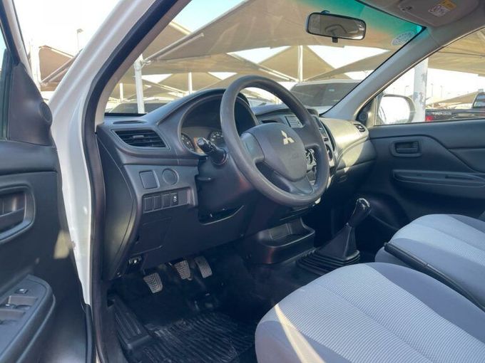 New Mitsubishi L200 V Facelift, 2.4 l, 2021 in Sharjah by Al Aram Cars, White color. GCC Specs | AUTO.AE