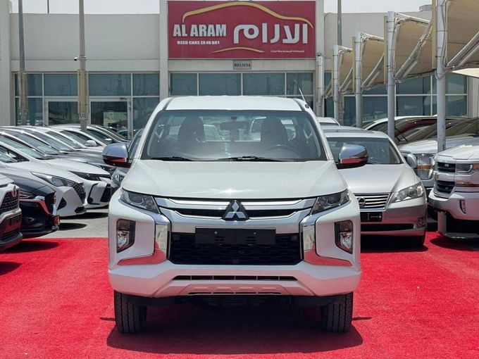 New Mitsubishi L200 V Facelift, 2.4 l, 2022 in Sharjah by Al Aram Cars, White color. GCC Specs | AUTO.AE