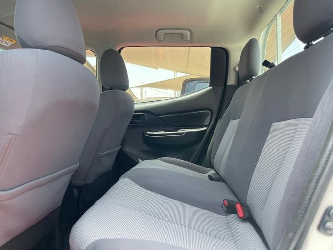 New Mitsubishi L200 V Facelift, 2.4 l, 2022 in Sharjah by Al Aram Cars, White color. GCC Specs | AUTO.AE