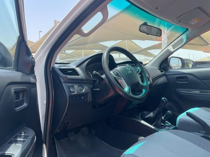 New Mitsubishi L200 V Facelift, 2.4 l, 2022 in Sharjah by Al Aram Cars, White color. GCC Specs | AUTO.AE