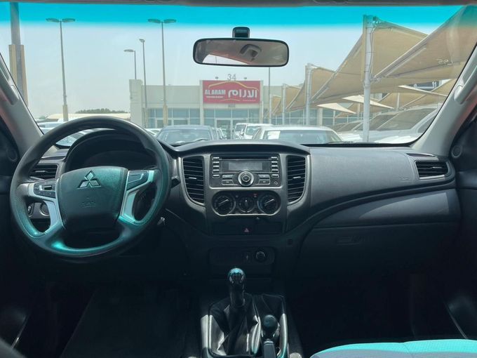 New Mitsubishi L200 V Facelift, 2.4 l, 2022 in Sharjah by Al Aram Cars, White color. GCC Specs | AUTO.AE