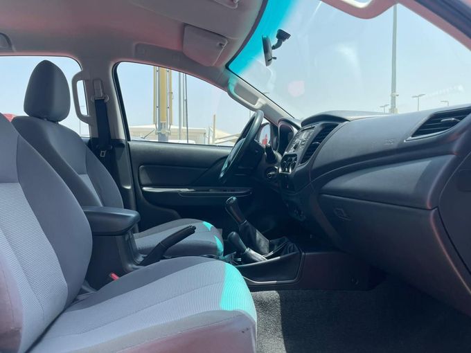 New Mitsubishi L200 V Facelift, 2.4 l, 2022 in Sharjah by Al Aram Cars, White color. GCC Specs | AUTO.AE