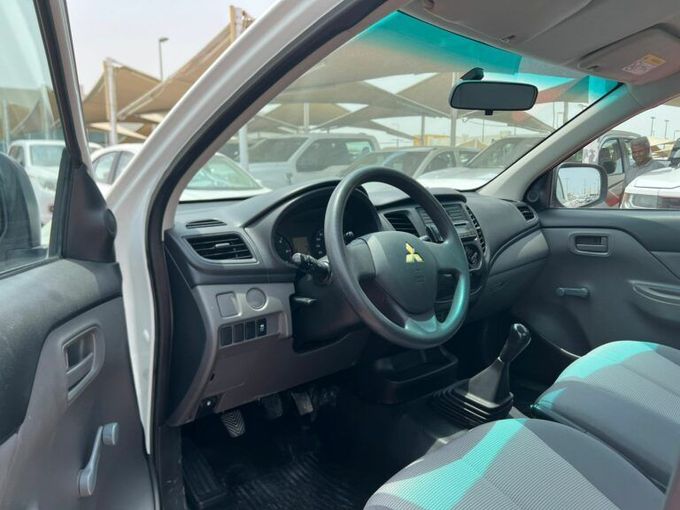 New Mitsubishi L200 V, 2.4 l, 2019 in Sharjah by Al Aram Cars, White color. GCC Specs | AUTO.AE