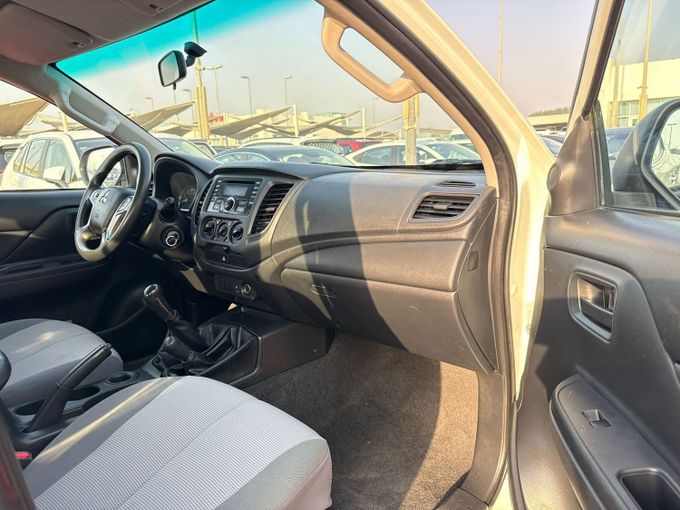 Used Mitsubishi L200 V Facelift, 2.4 l, 2022 in Sharjah by Al Aram Cars, White color. GCC Specs | AUTO.AE