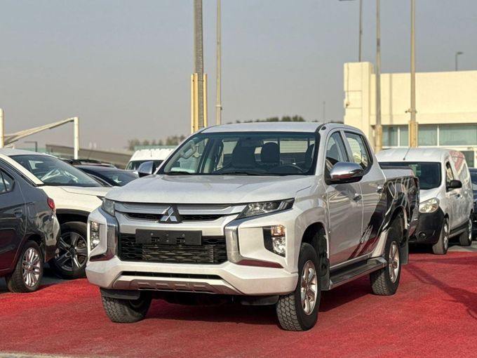 Used Mitsubishi L200 V Facelift, 2.4 l, 2020 in Sharjah by Al Aram Cars, White color. GCC Specs | AUTO.AE