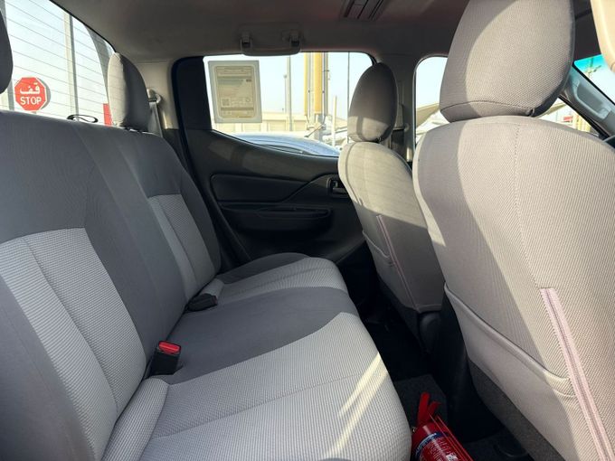 Used Mitsubishi L200 V Facelift, 2.4 l, 2020 in Sharjah by Al Aram Cars, White color. GCC Specs | AUTO.AE