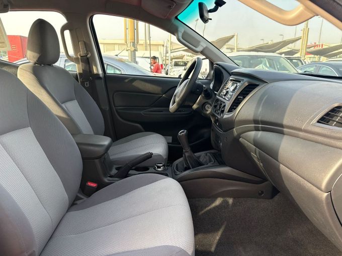 Used Mitsubishi L200 V Facelift, 2.4 l, 2020 in Sharjah by Al Aram Cars, White color. GCC Specs | AUTO.AE