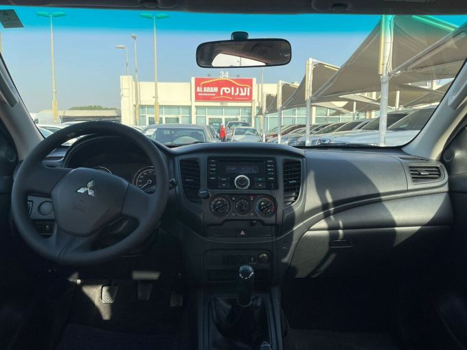 Used Mitsubishi L200 V Facelift, 2.4 l, 2020 in Sharjah by Al Aram Cars, White color. GCC Specs | AUTO.AE