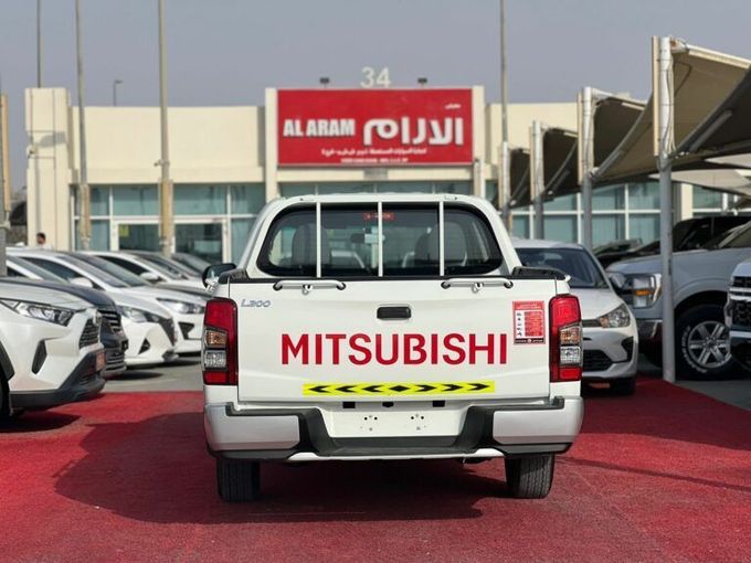 New Mitsubishi L200 V Facelift, 2.5 l, 2022 in Sharjah by Al Aram Cars, White color. GCC Specs | AUTO.AE