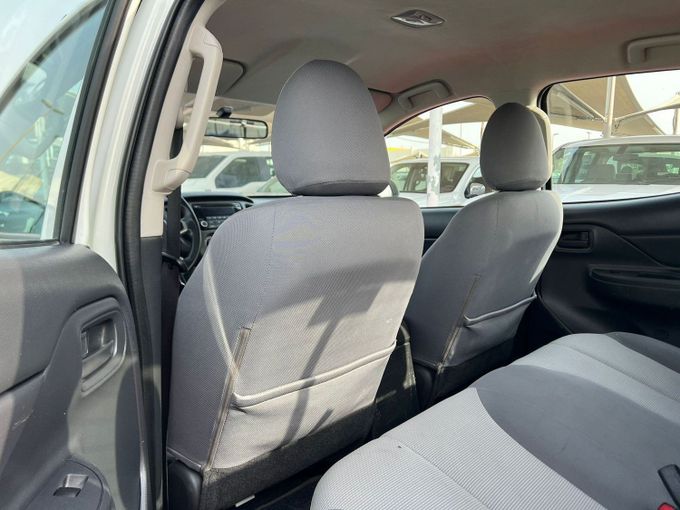 Used Mitsubishi L200 V Facelift, 2.4 l, 2023 in Sharjah by Al Aram Cars, White color. GCC Specs | AUTO.AE