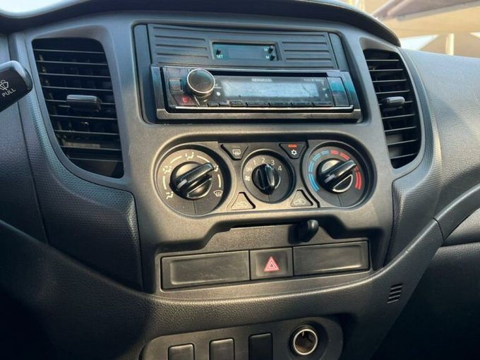 New Mitsubishi L200 V Facelift, 2.4 l, 2021 in Sharjah by Al Aram Cars, White color. GCC Specs | AUTO.AE
