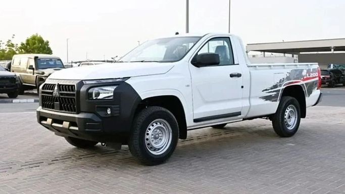 New Mitsubishi L200 VI, 2.4 l, 2025 in Sharjah by Nour Alnukhba Motors, White color. Other | AUTO.AE