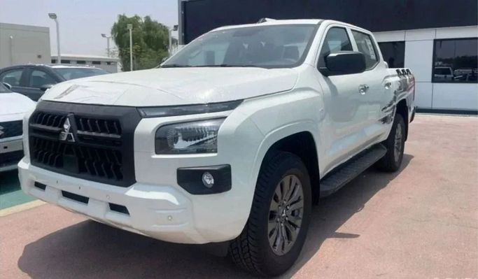 New Mitsubishi L200 VI, 2.4 l, 2025 in Sharjah by Nour Alnukhba Motors, Grey color. GCC Specs | AUTO.AE
